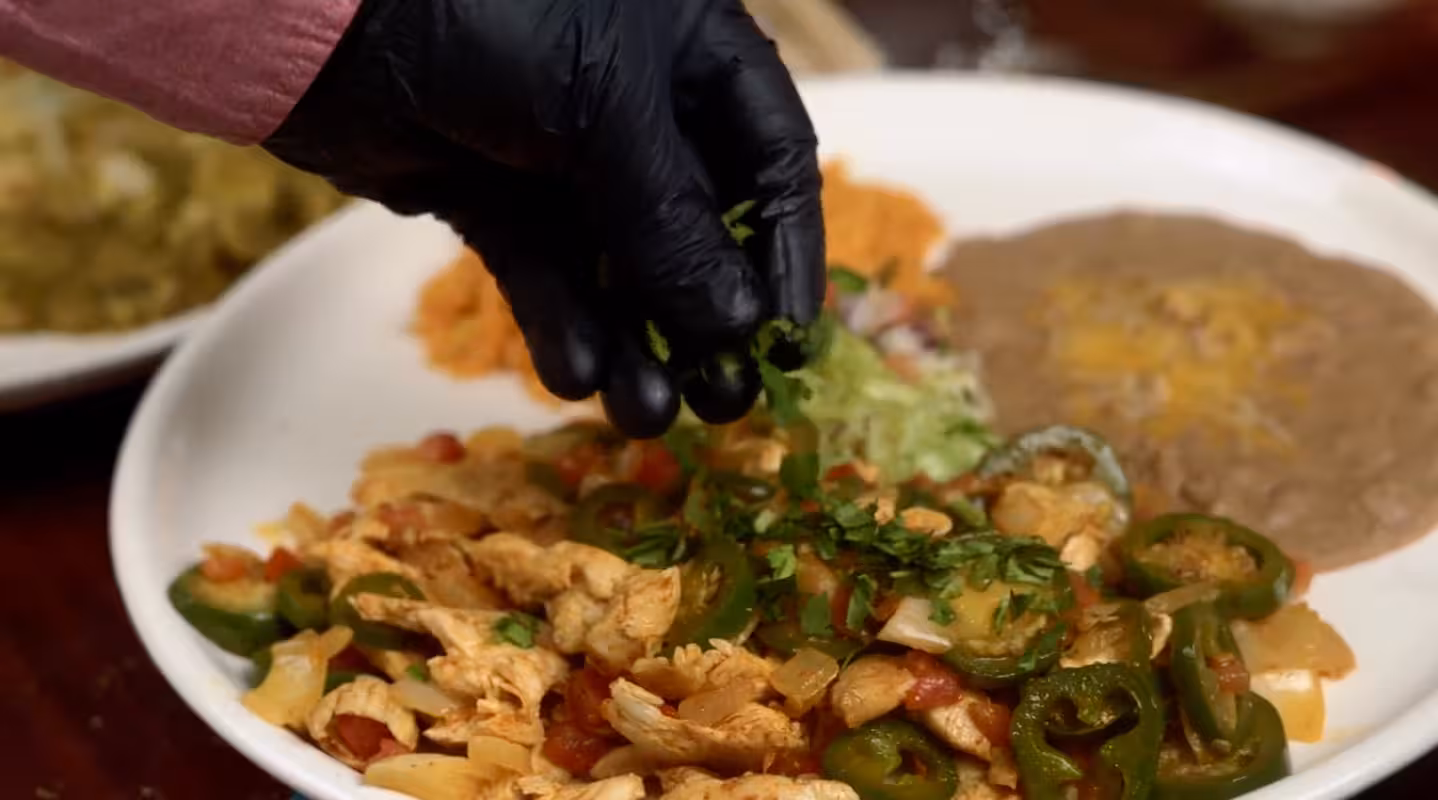 Guests enjoying authentic Mexican dishes at Tequila's Mexican Restaurant in Golden, Colorado.