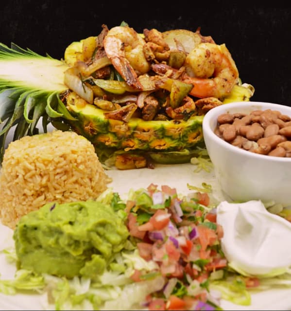 Sizzling fajitas and sides ready to serve